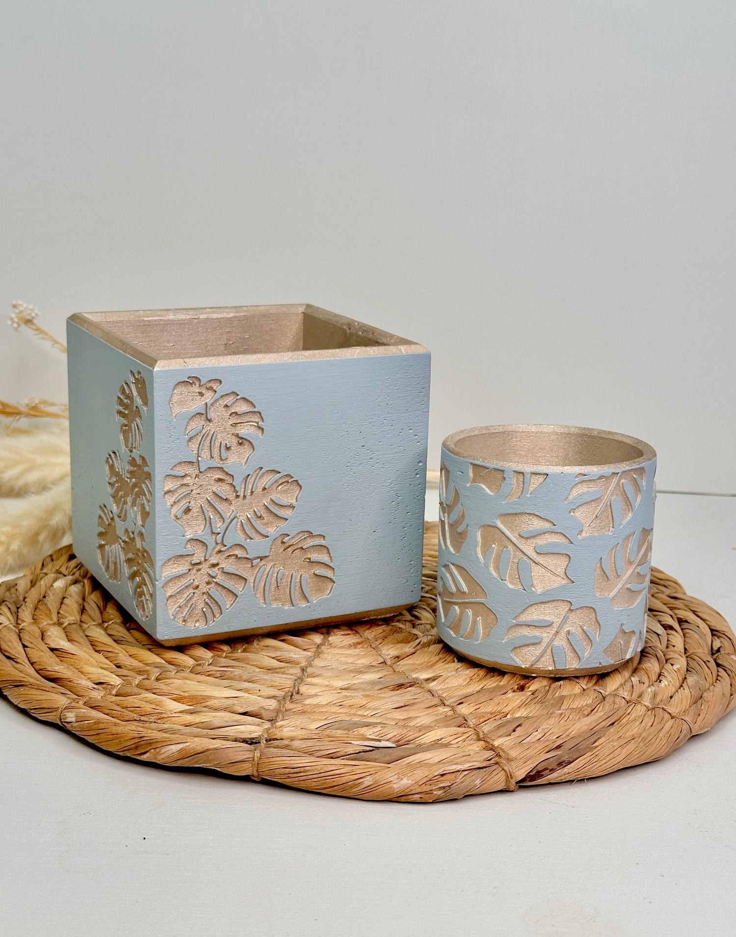 monstera leaf design blue and gold pots handmade planters